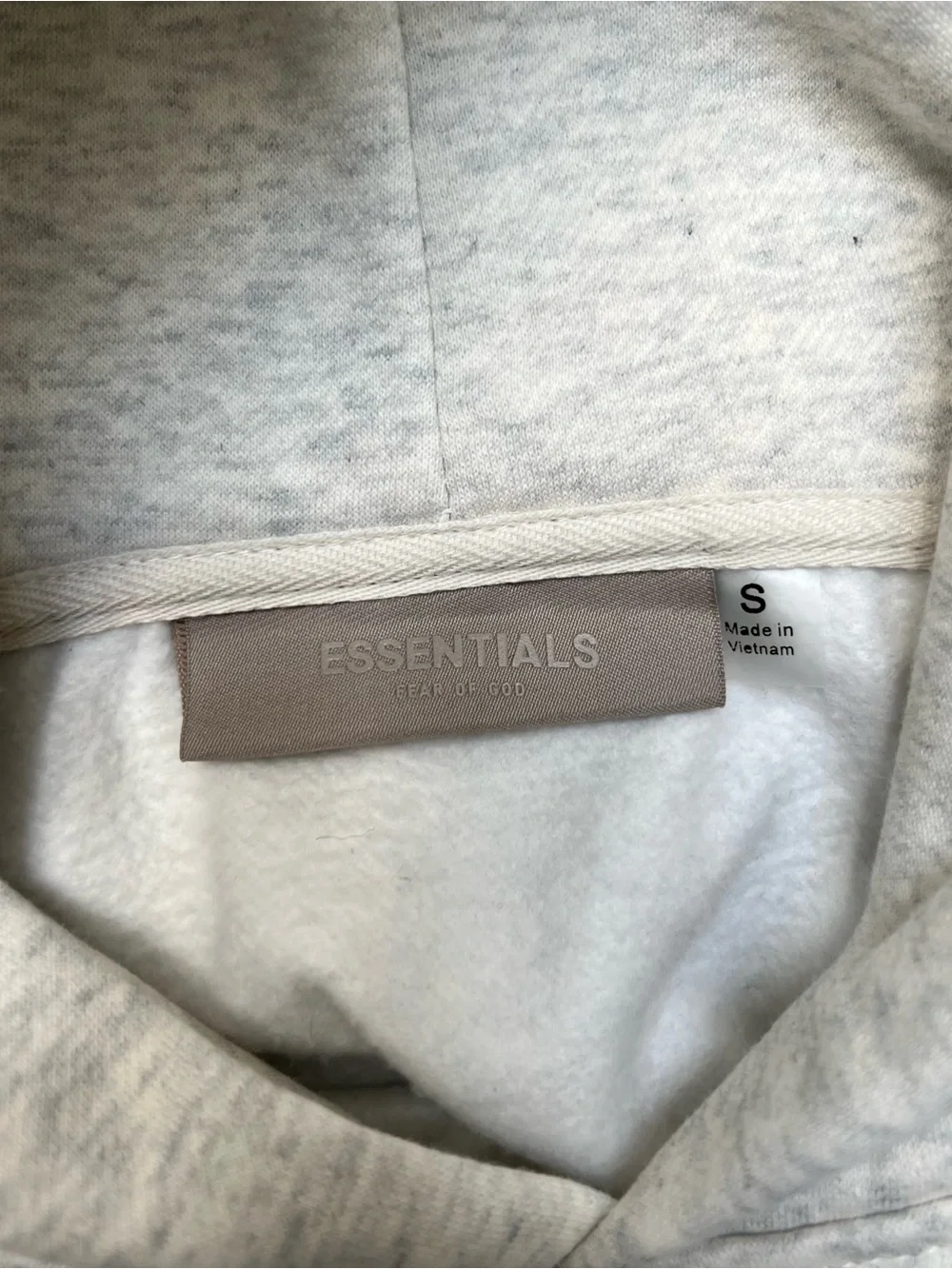 Fear of God Essentials Light Cream Hoodie with Chest Logo